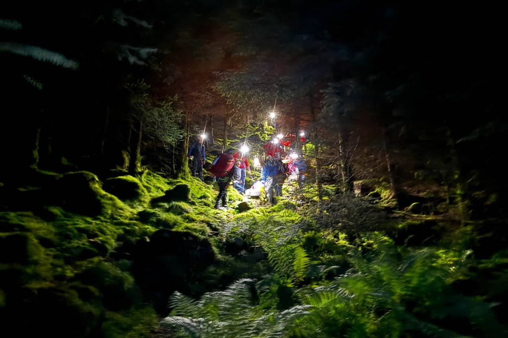 Rescuers stretchered the runner's body from the fell. Photo: Cockermouth MRT