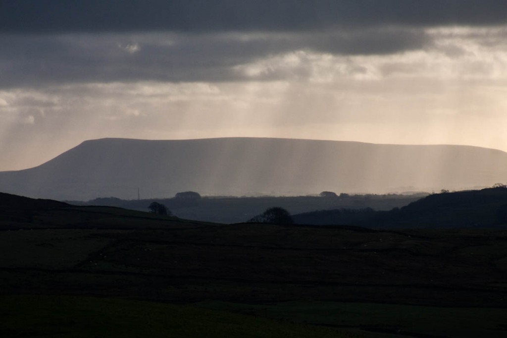 Pendle Hill's bulky profile dominates the Ribble Valley